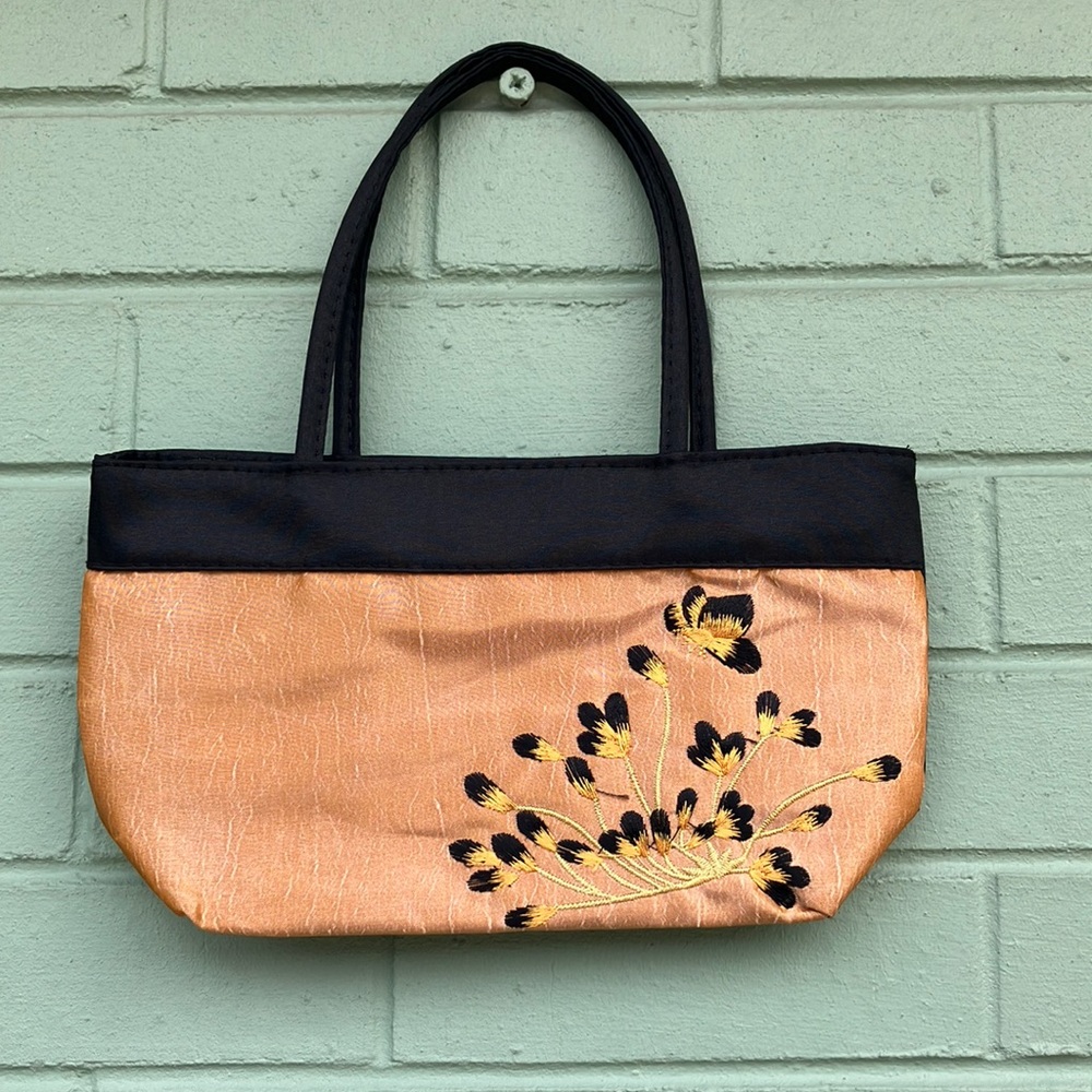 Max Grey mini bag with embroidery design on the front